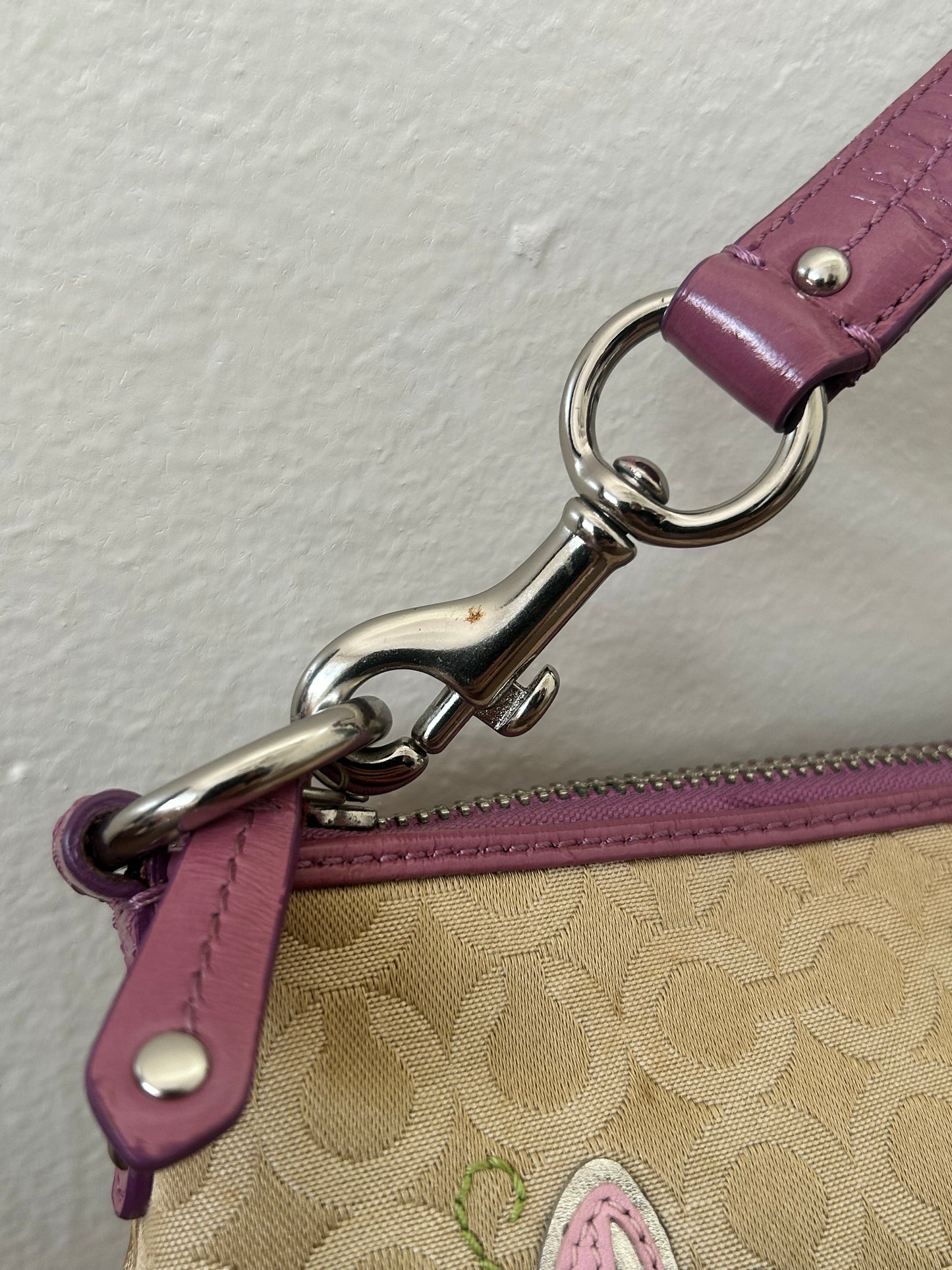 Coach shoulder bag flower appliqué
