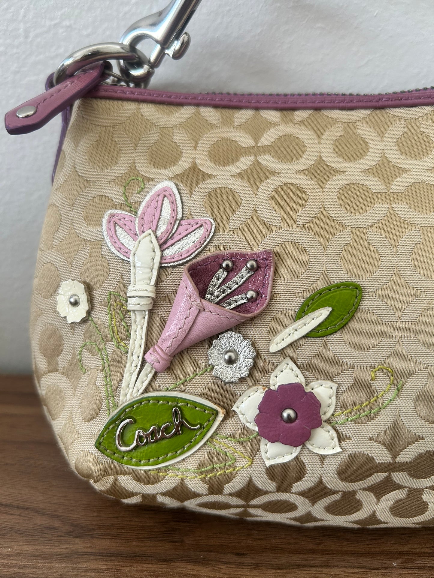 Coach shoulder bag flower appliqué