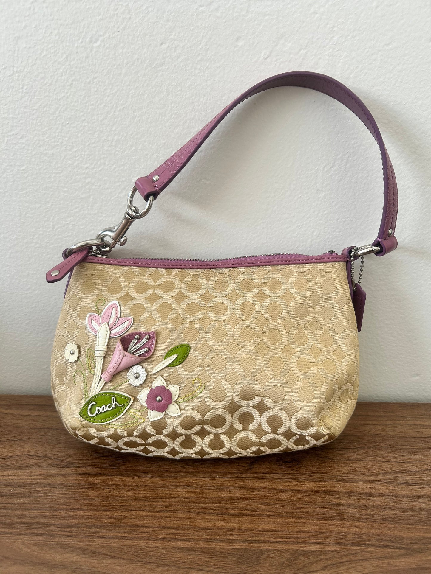 Coach shoulder bag flower appliqué